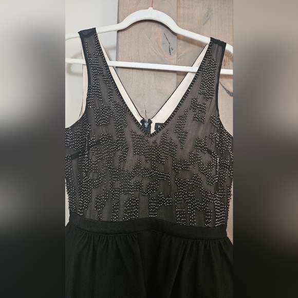 BEBE 90s Beaded top peplum mini dress. Size small - Picture 4 of 11